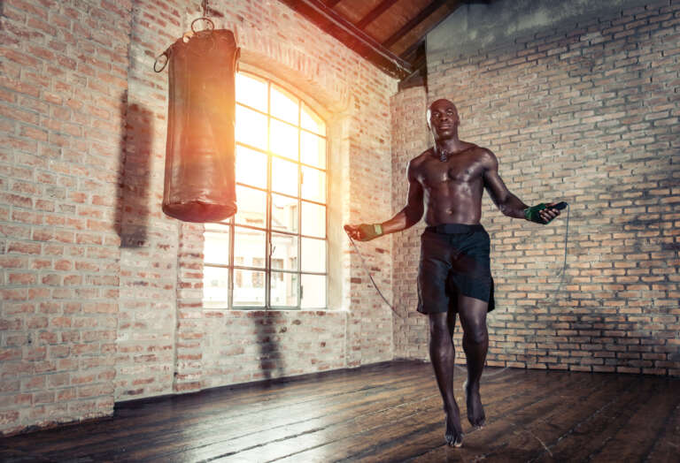 fighter-training-hard-in-his-gym-using-rope-ROOQ-boxing